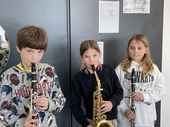 Musikus Musikantenkinder mit Instrumenten
